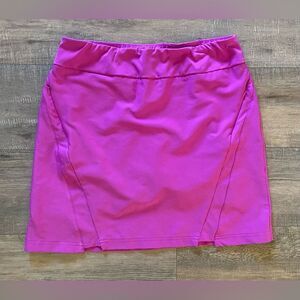 Tail women’s size 12 stretch fuchsia solid print golf or tennis skort skirt
